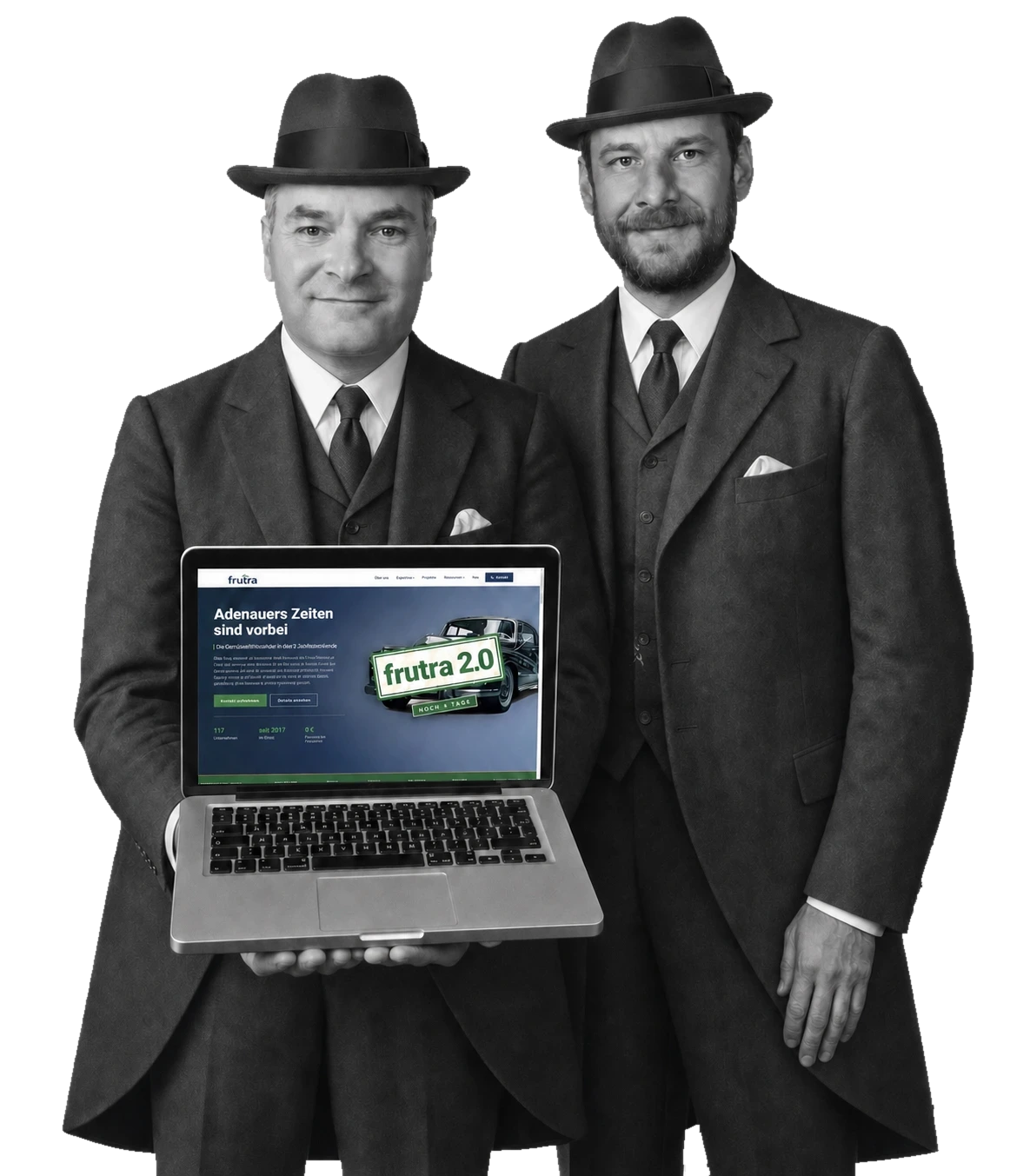 Wolfgang Baumann and Samuel Fürle, founders of frutra GbR, with a laptop showing the frutra home page